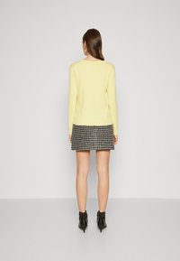 Tommy Hilfiger Pulover - yellow tulip