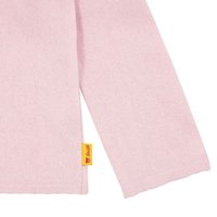 Rosa Langarmshirt aus weichem Stoff. Mit einem schrägen Saum und einem gelben Etikett mit einem Logo an der Seitennaht.