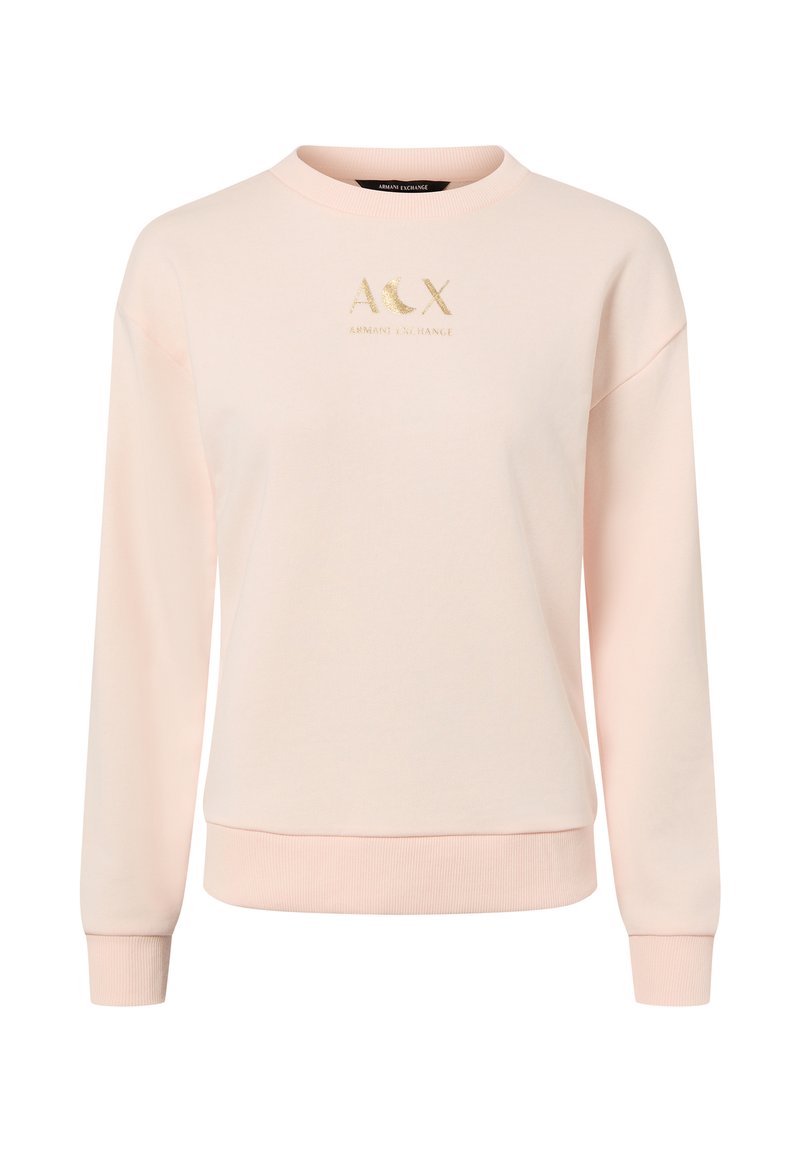 Sweat-shirt rose pâle avec un col rond et des manches longues. Il présente un logo brodé en or sur la poitrine ainsi que des poignets et un ourlet côtelés.