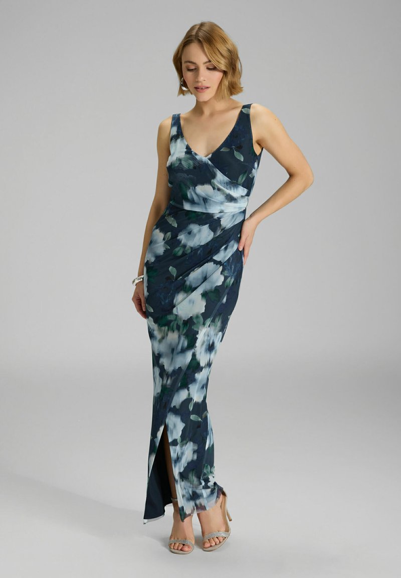 Blumenkleid für den Abend in Dunkelblau mit hellblauen und grünen Mustern, figurbetonter Schnitt, tiefem V-Ausschnitt und seitlichem Schlitz. Weicher, fließender Stoff.