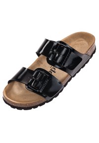 Sandal in pelle verniciata nera con due cinturini regolabili, soletta in sughero e suola in gomma testurizzata. Superficie liscia con fibbie.