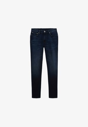 Jean en denim bleu foncé avec une coupe slim, comportant cinq poches, une fermeture éclair et de légères marbrures sur le devant pour ajouter de la texture.