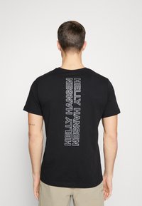 Helly Hansen CORE GRAPHIC - Triko s potiskem - black