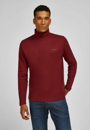 Burgunderfarbener Rollkragenpullover mit langen Ärmeln, aus weichem Stoff, mit einem dezenten Logo auf der Brust und einer figurnahen Passform.