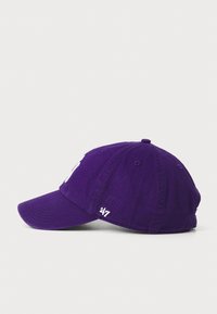 Purple baseball cap with a curved brim, made of cotton fabric, featuring white embroidered detailing at the front and side.