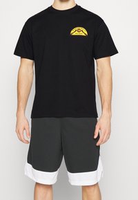 Nike Performance T-shirt imprimé - black