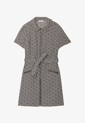 Robe courte aux manches courtes avec motif géométrique noir et blanc, fermeture éclair avant, col, ceinture à la taille et poches latérales zippées.