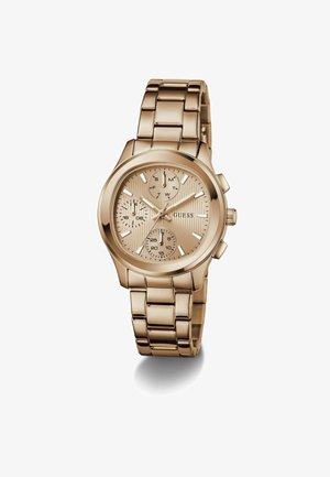 Zlaté kovové hodinky s texturovaným béžovým ciferníkem, třemi subciferníky a designem propojeného náramku. Mají lesklý povrch a jasné hodinové značky.