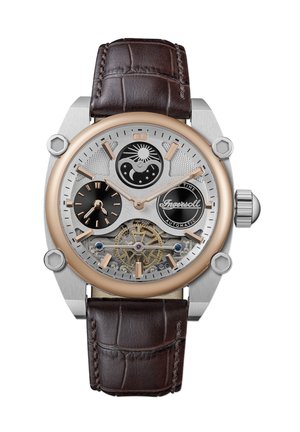Montre automatique avec un boîtier en acier inoxydable et or rose, bracelet en cuir de crocodile marron, cadran squelette et indicateurs de phase de soleil/lune.