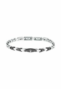 Silver metal bracelet with alternating black accents, featuring a central logo plate and a modern link design with a sleek finish.