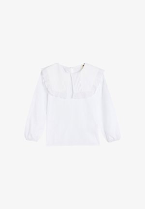 Camicia bianca a maniche lunghe con un grande colletto arricciato, dettaglio plissettato sul davanti e chiusura con bottoni sul retro. Tessuto morbido.