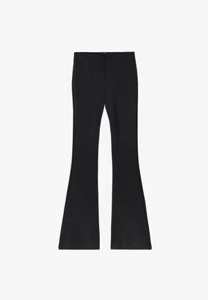 Black flared pants made of stretchy fabric. High waist with a smooth texture and a flared hem design that extends below the knee.