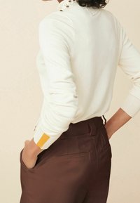 Next Sweter