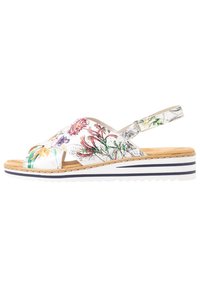 Sandaler med blommönster som har ett vitt syntetiskt ovandel med flerfärgade blommor, en korkfotbädd och en randig kilklack.