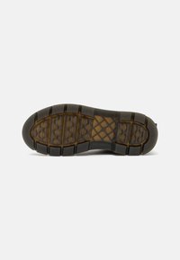 Dr. Martens Botines con plataforma - olive