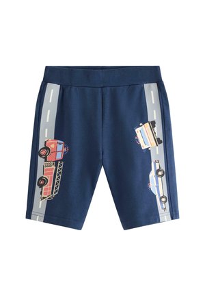 Marineblå børneshorts med vejstriber og illustrationer af en brandbil, politibil og ambulance langs siderne.