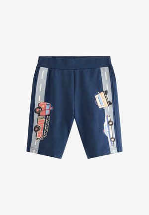 Marineblå børneshorts med vejstriber og illustrationer af en brandbil, politibil og ambulance langs siderne.