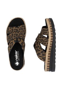 Sandales à glissière en imprimé léopard avec des accents noirs, comprenant un design à brides croisées, une semelle texturée et un entresemelle en jute tressé.