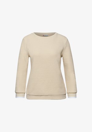 Beige tekstuurinen pitkähiha-paita pyöreällä pääntiellä ja resorireunuksilla, joissa on valkoisia ja beigejä raitoja.