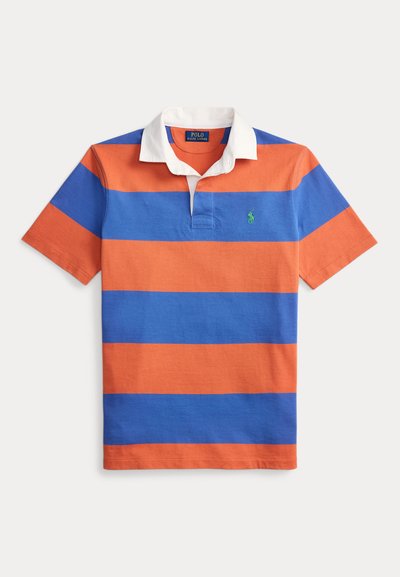 Πόλο με κοντά μανίκια σε πορτοκαλί και μπλε ρίγες με λευκό γιακά και πράσινο λογότυπο. Βαμβακερό ύφασμα, κλασική εφαρμογή και τρεις κουμπότρυπες.