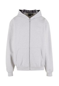 Sudadera con cremallera gris claro, con bolsillos frontales, puños acanalados y forro interior de capucha con un patrón en blanco y negro.