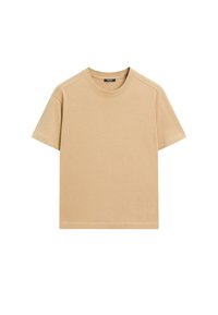 T-shirt in cotone beige con maniche corte, scollatura rotonda e vestibilità rilassata. Presenta una texture liscia e cuciture pulite senza fantasie.