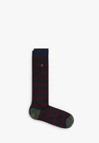 Calze al ginocchio con strisce blu navy e borgogna. Dettagli verde sul tallone e sulla punta. Texture morbida a costine; dettaglio del logo vicino al polsino.
