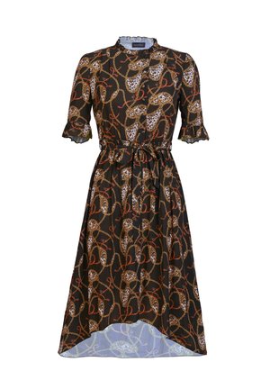 Black dress with brown and white leopard print, featuring an intricate chain and bow pattern. Ruffled sleeves and a belt at the waist.