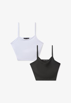 Due top crop in tessuto morbido, uno bianco e uno nero. Design aderente con scollatura dritta.