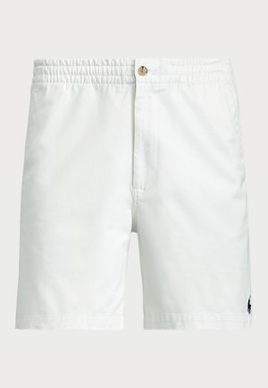 Shorts de bain en coton blanc avec une taille élastique, fermeture à bouton et un petit détail de logo marine en bas à gauche. Texture lisse.
