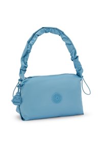 Jasnoniebieska torebka nylonowa z falbaniastym uchwytem, zapinana na zamek, z okrągłym wytłoczonym logo. Zawiera mały wisiorek.