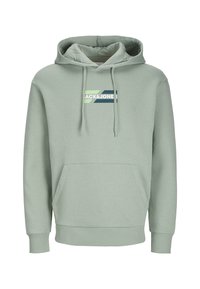 Haut à capuche vert clair avec une poche devant. Caractérisé par des cordons de serrage au col et un logo en marine et vert sur la poitrine. Matériau doux.