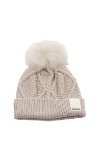 Cappellino beige lavorato a maglia con risvolto, caratterizzato da un grande pon pon in pelliccia sintetica sulla sommità e una piccola etichetta sul lato. Motivo a treccia lavorato a maglia testurizzata.