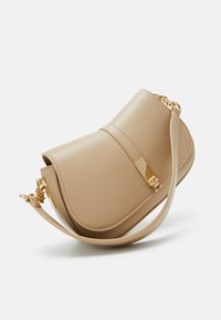 Tommy Hilfiger HERITAGE SADDLE BAG - Käekott - beige