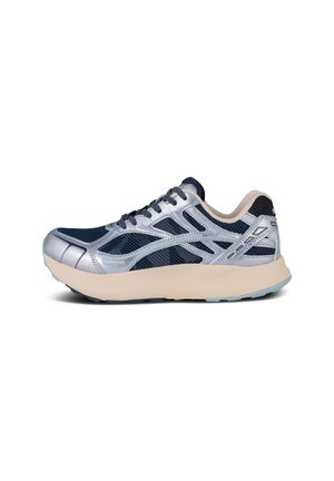Men's running shoe with a navy mesh upper, silver synthetic accents, and a lightweight beige sole. Features textured detailing and laces.