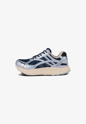 Men's running shoe with a navy mesh upper, silver synthetic accents, and a lightweight beige sole. Features textured detailing and laces.