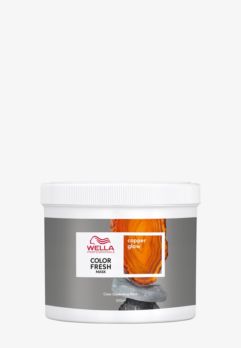Wella Professionals Color Fresh Mask in een witte verpakking. Grijze label met "copper glow," een grafische afbeelding van een oranje steen, en een capaciteit van 500ml.