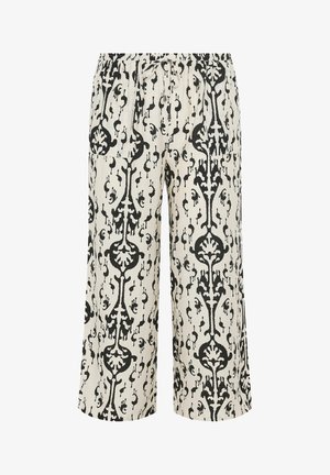 Loose-fit, mid-length pants with black and white abstract floral pattern, elastic waistband, and front patch pockets.