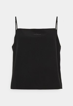 Haut caraco noir à fines bretelles avec un petit logo Calvin Klein Jeans centré près de l'encolure.