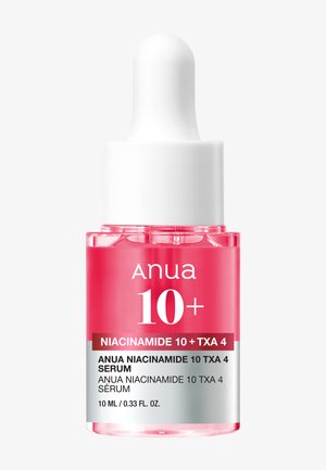 Flacon de sérum Anua 10+ Niacinamide et TXA 4 avec bouchon compte-gouttes blanc, liquide rose et étiquette de volume de 10 ml (0,33 fl. oz.).