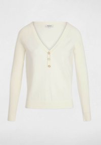 Maglietta a maniche lunghe color crema con righe, scollatura a V profonda e patta con tre bottoni. Tessuto morbido e design aderente con una finitura semplice e pulita.