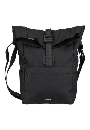 Black roll-top backpack with front buckle closure, adjustable shoulder straps, and small front pocket, branded "Sandqvist" at bottom center.