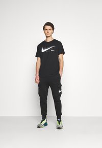 Nike Sportswear Trainingsbroek - black