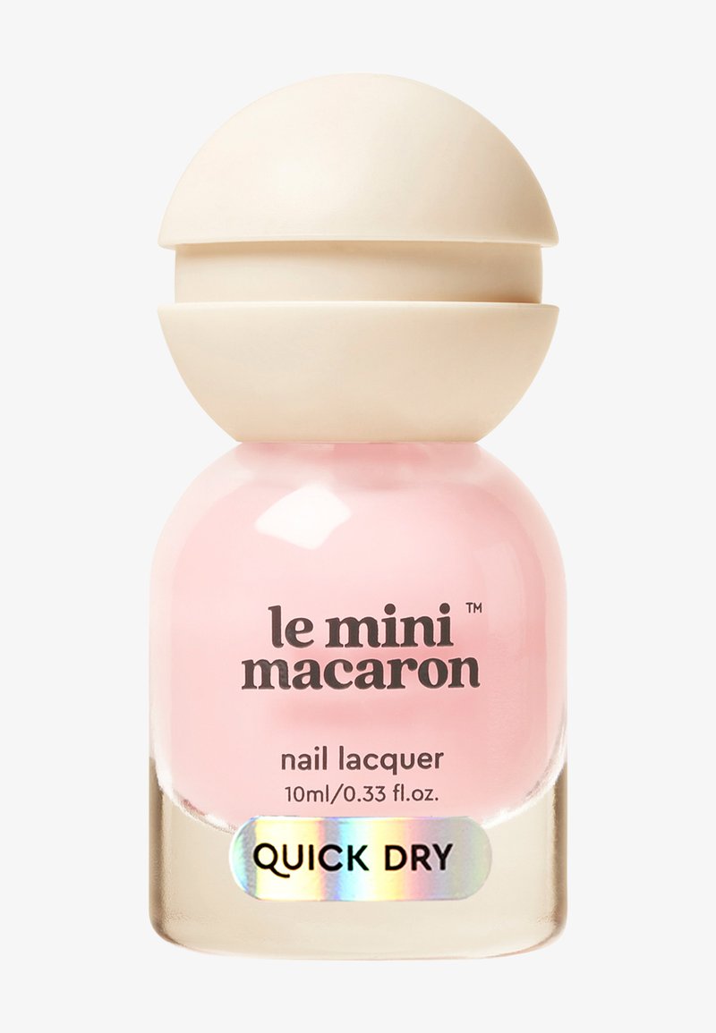 Różowa butelka lakieru do paznokci z zaokrągloną beżową nakrętką, oznaczona "le mini macaron", 10 ml, formuła szybkiego schnięcia.