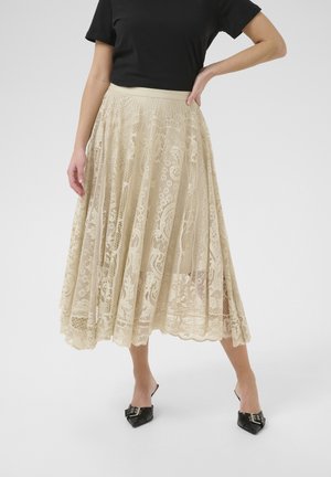 Gonna midi in pizzo beige con un design plissettato, caratterizzata da intricate fantasie floreali. La vita è elastica, aumentando il comfort e la vestibilità.