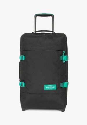 Borsa da viaggio nera con ruote, foderata con fibbie e dettagli turchesi, realizzata in tessuto resistente, dotata di manico telescopico ed etichetta.