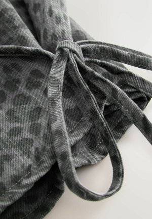 Gray textured fabric with a subtle leopard print pattern, featuring long ties for fastening and a stitched hem detail.