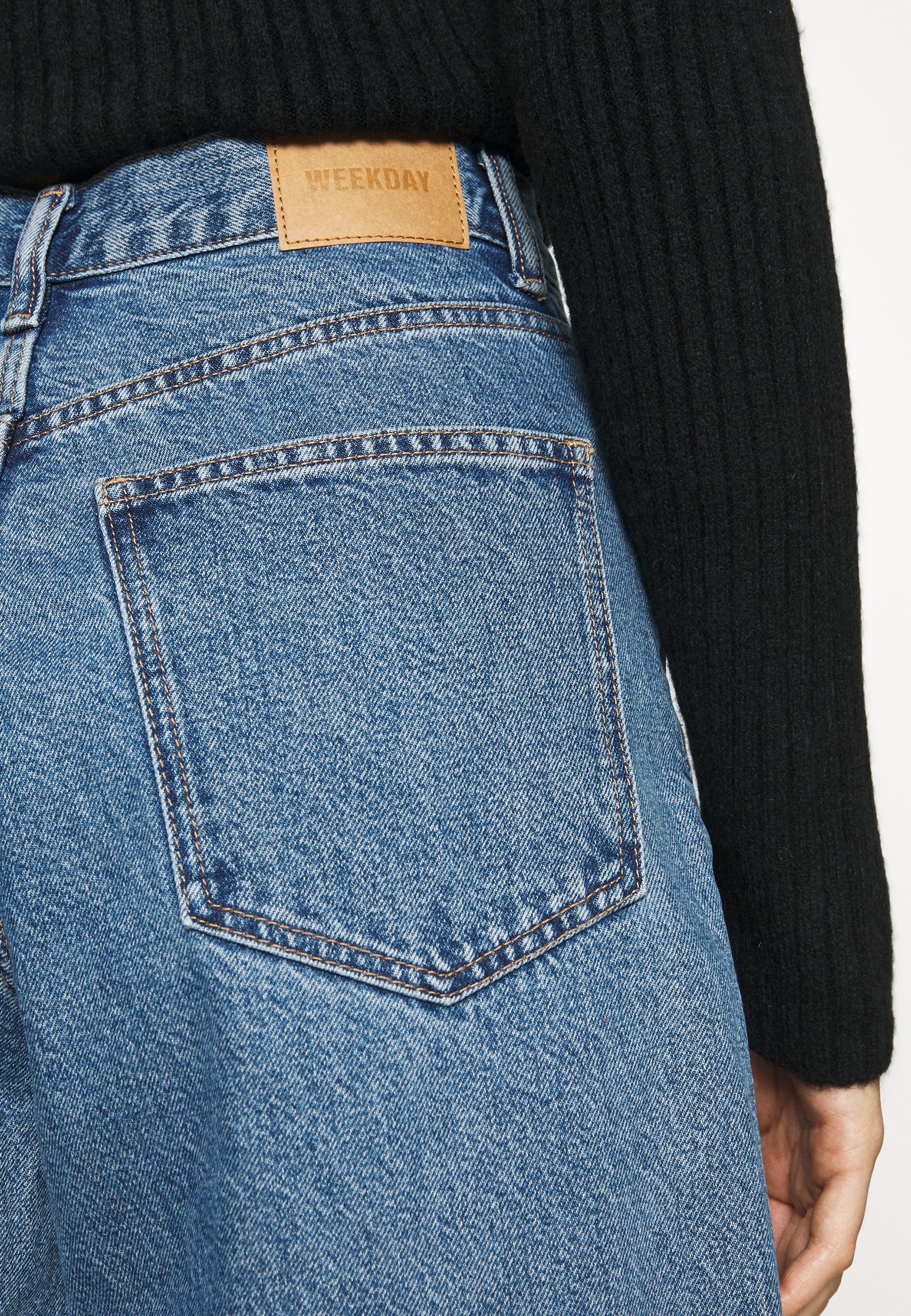 damaged jeans from the 90s