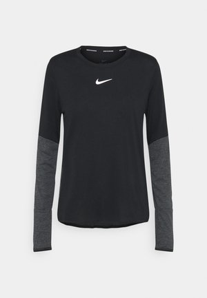 T-shirt de course Nike noir à manches longues avec manches inférieures gris foncé et logo Nike Swoosh blanc centré sur la poitrine.