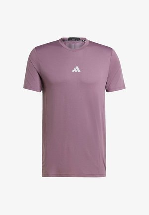 Maglietta da allenamento Adidas di colore lilla chiaro con maniche corte e logo bianco posizionato al centro del petto, collo rotondo.